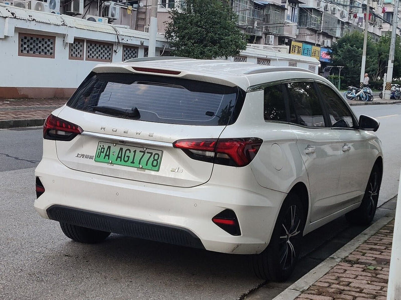 MG MG5 EV ESTATE FACELIFT (EP22) 2021-ON REAR BUMPER GENUINE PDC HOLES