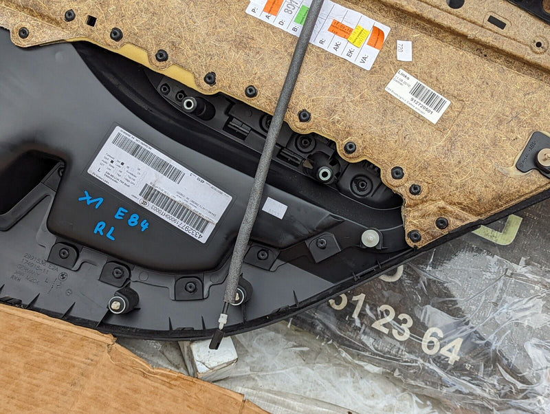 BMW X1 E84 09-15 REAR LEFT N/S DOOR CARD GENUINE 2991536