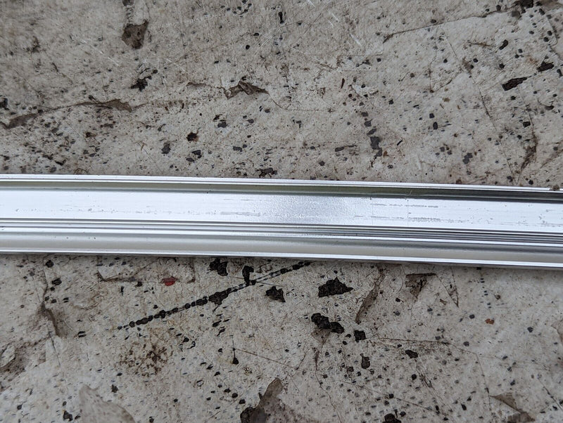 AUDI E-TRON 2018-ON LEFT N/S WINDOW GUIDE MOLDING TRIM STRIP 4KE837643 GENUINE